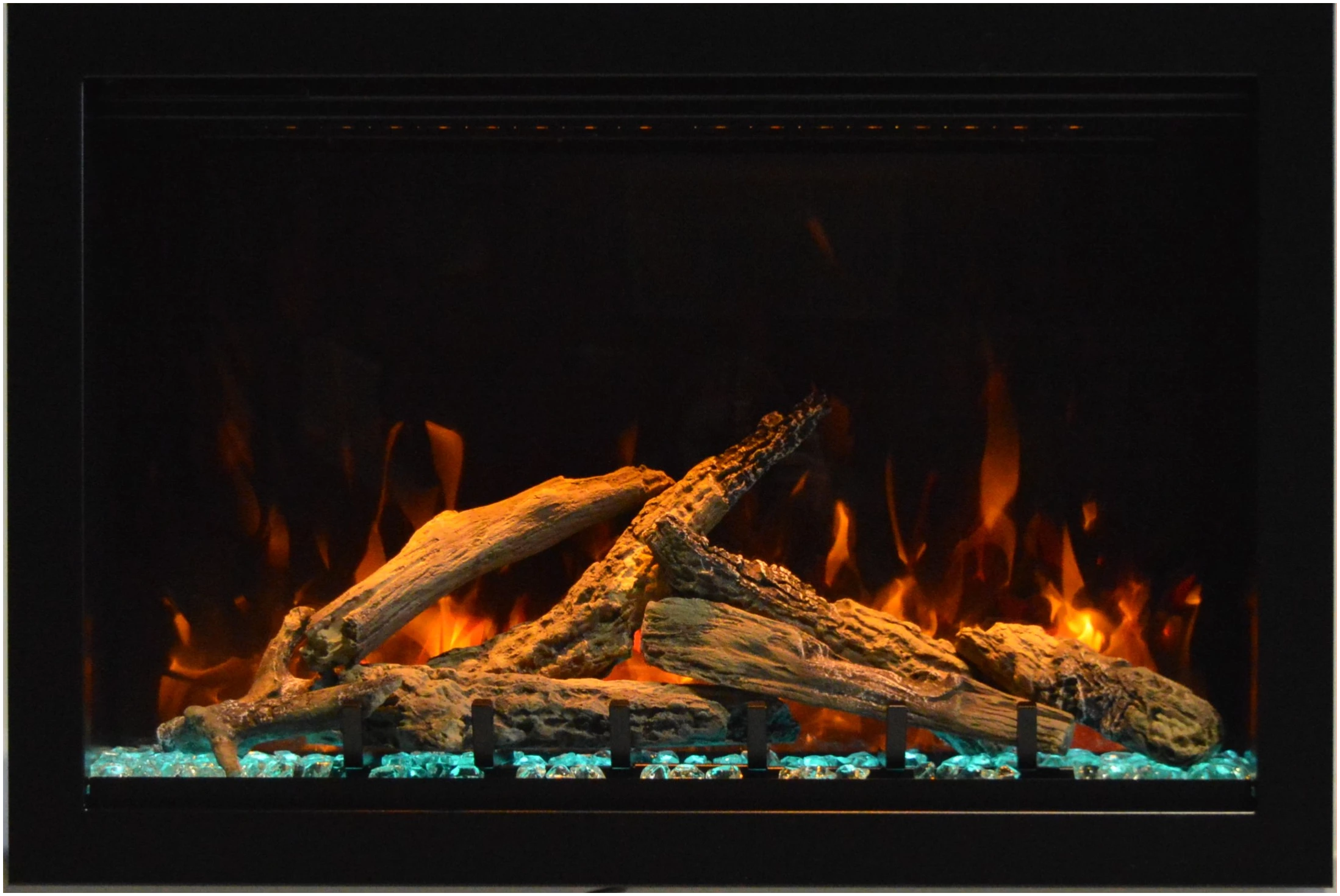 Amantii Lumina 26” Fireplace – includes a steel trim, glass inlay, 12 piece oak log set with remote and cord